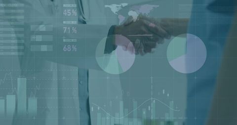 Doctor and colleague shaking hands with overlay of digital charts