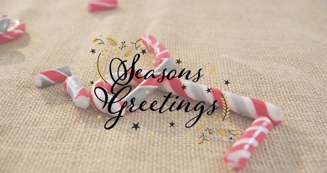 Festive Season's Greetings with Holiday Candy Canes - Download Free Stock Images Pikwizard.com