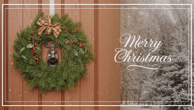 Evergreen wreath with deer door knocker and snowy merry christmas greeting on rustic door