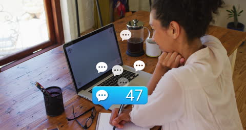 Animated Message Notifications on Laptop Screen with Woman