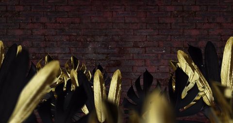 Creative Brick Wall with Futuristic Golden Dramatic Leaves