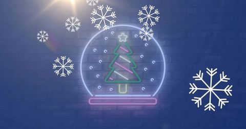 Glowing neon snow globe with christmas tree, star and falling snowflakes on blue brick wall