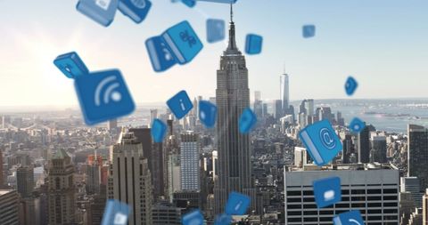Falling 3D Social Media Icons Over Modern City Skyline