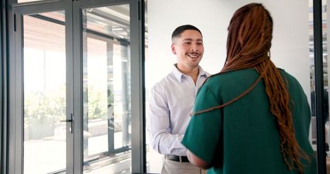 Confident Business Professionals Engaging in Productive Discussion