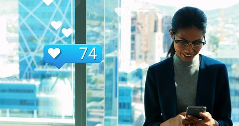 Professional Woman Engaging with Social Media Notifications - Download Free Stock Images Pikwizard.com