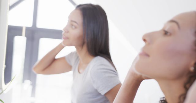 Two Women Getting Ready in Front of Mirror - Download Free Stock Images Pikwizard.com