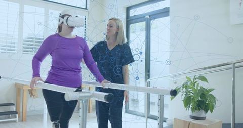 Patient with VR Headset and Prosthetic Limb in Rehabilitation Session