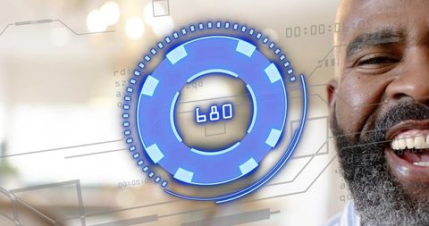 Smiling mature bearded man with blue futuristic HUD overlay 680 biometric interface warmth