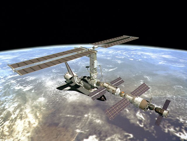 This concept depicts the International Space Station in orbit following its solar array deployment by the crew of the Space Shuttle STS-97 mission.