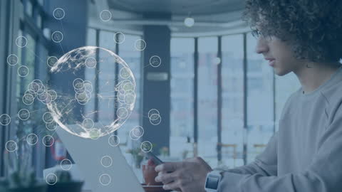 Digital Connectivity Concept with Man Using Smartphone at Cafe