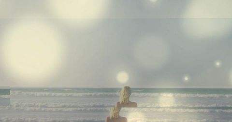 Dreamy Beach Scene with Woman in Serene Ocean View