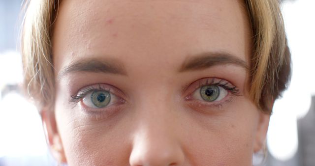 Close-Up of Young Woman's Green Eyes and Face - Download Free Stock Images Pikwizard.com