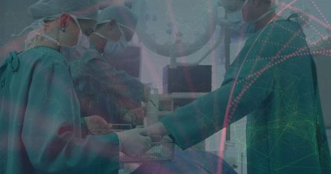 Surgical team coordinating in high-tech operating room