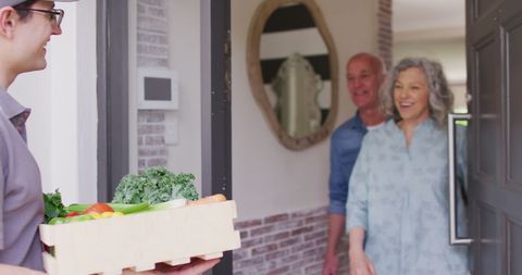 Senior Couple Receiving Grocery Delivery at Home - Download Free Stock Images Pikwizard.com