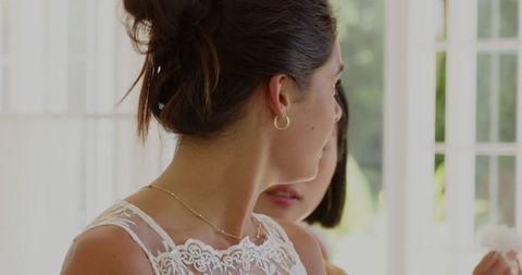 Bride in Lace Dress Smiling Joyfully During Ceremony