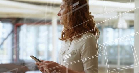 Businesswoman Navigating Digital Interface in Modern Office