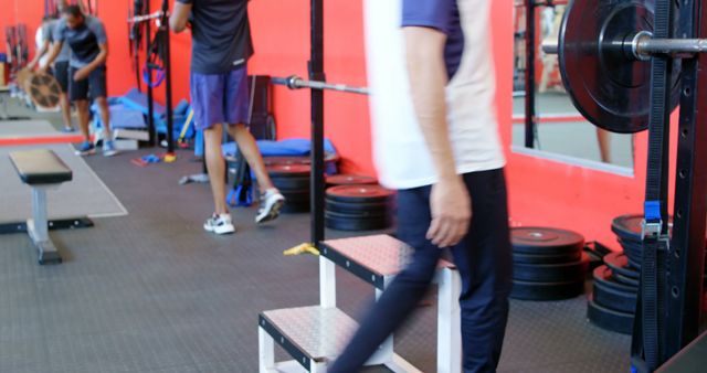 People Working Out in Gym with Modern Fitness Equipment - Download Free Stock Images Pikwizard.com