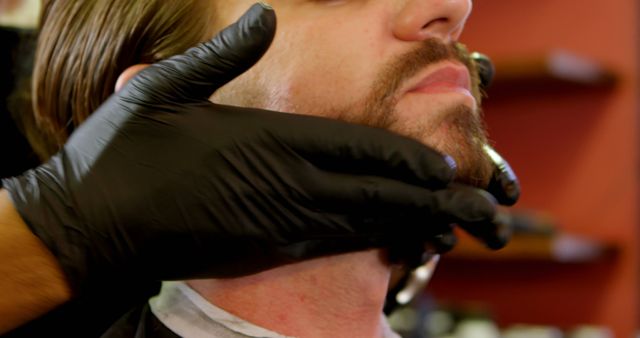 Close-up Barber Adjusting Beard of Bearded Man - Download Free Stock Images Pikwizard.com