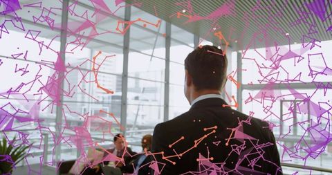 Businessman Insightfully Analyzing Digital Network Interface