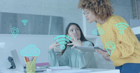 Women Collaborating with Digital Interface Icons in Modern Office - Download Free Stock Images Pikwizard.com