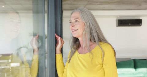 Mature Woman Enjoying Tranquil Moment at Home