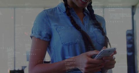 Smiling Professional Woman Holding Smartphone with Technology Overlay