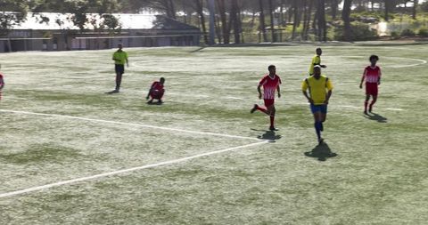 Intense Soccer Match on Sunny Day with Athletes in Action - Download Free Stock Images Pikwizard.com