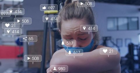 Gym influencer coughing while lowering mask with social media notifications overlay