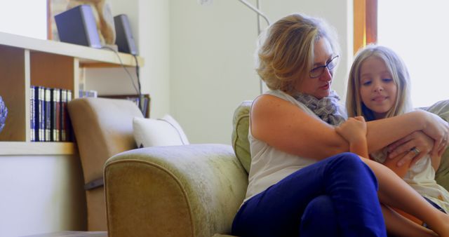 Mother Comforting Daughter on Couch at Home - Download Free Stock Images Pikwizard.com