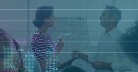 Business leaders analyzing market trends with data visuals