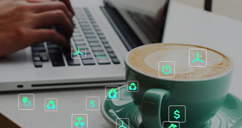 Digital Work Environment with Sustainability Icons and Coffee