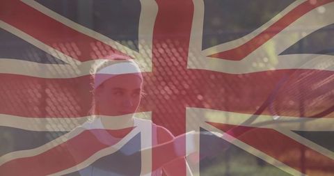 Energetic female tennis player with union jack overlay