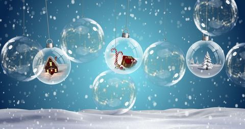Floating Christmas Baubles with Winter Scenes and Falling Snow - Download Free Stock Images Pikwizard.com