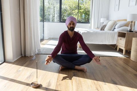Turbaned Man Meditating by Window with Incense