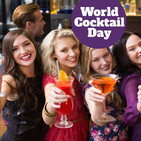 Friends celebrating world cocktail day with cheers and laughter