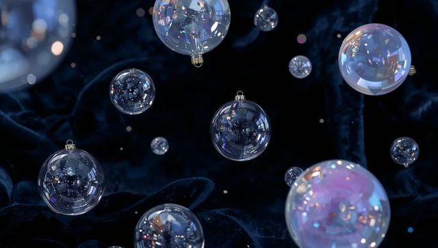 Floating mirrored glass baubles over dark velvet with iridescent reflections and bokeh