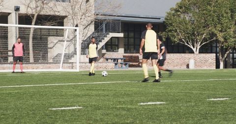 Soccer Players Training Outdoor on Sunny Day