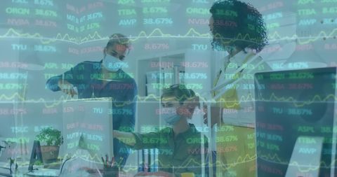 Colleagues Analyzing Financial Data While Observing COVID-19 Precautions