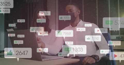 Two colleagues collaborating on social media analytics with engagement metrics overlay