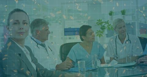 Healthcare professionals collaborating in modern boardroom