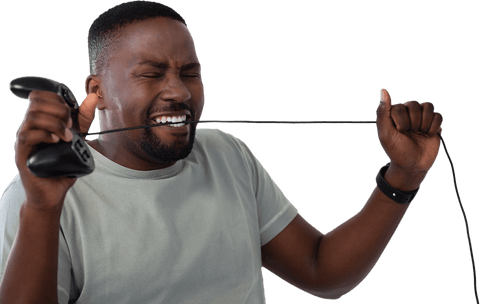Frustrated African American Gamer Biting Joystick Wire Transparent Background - Download Free Stock Videos Pikwizard.com