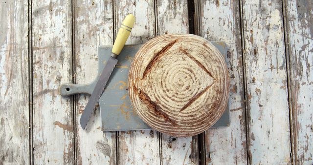Rustic Artisan Bread Loaf on Vintage Wooden Table - Download Free Stock Images Pikwizard.com