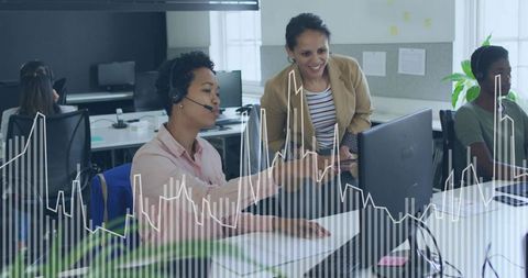 Customer support agent receiving mentoring at desktop with headset and team collaboration overlay