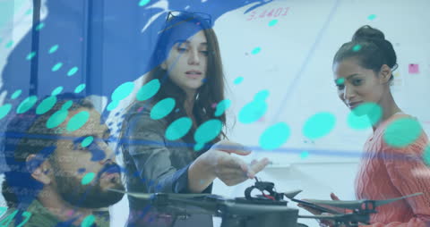 Innovative Team Analyzing Financial Data with Tech Overlay