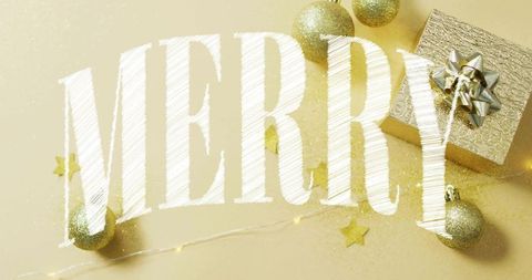 Merry lettering featuring gold baubles, glitter gift and twinkle lights for holiday design