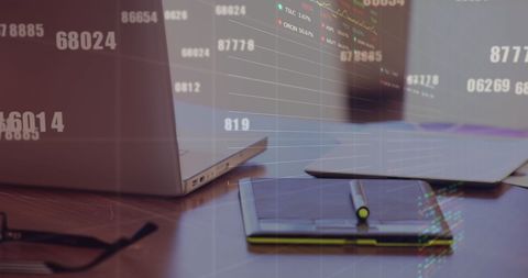 Financial Stock Market Technology Overlapping on Office Desk - Download Free Stock Images Pikwizard.com
