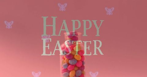 Easter greetings with colorful eggs in glass jar