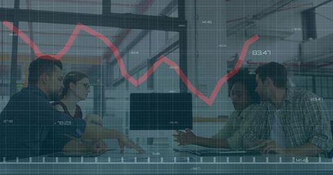 Business team analyzing financial data in modern workspace