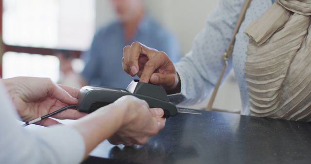 Close-Up of Hands Using Fingerprint Scanner for Security Identification - Download Free Stock Images Pikwizard.com