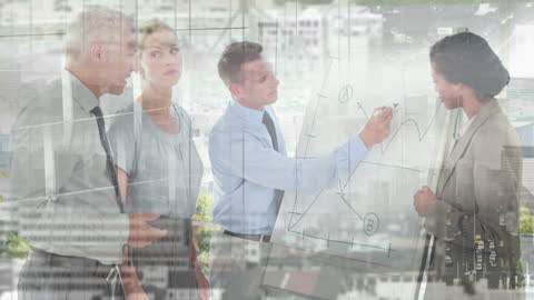 Business Team Analyzing Strategy with Digital City Overlay